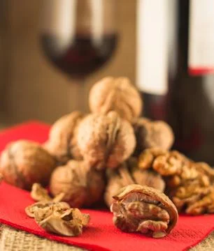 Walnuts and red wine Stock Photos