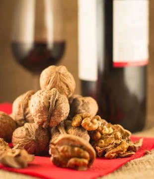 Walnuts and red wine Stock Photos