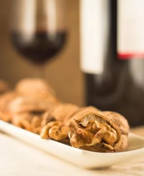 Walnuts and red wine Stock Photos