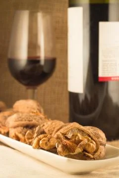 Walnuts and red wine Stock Photos