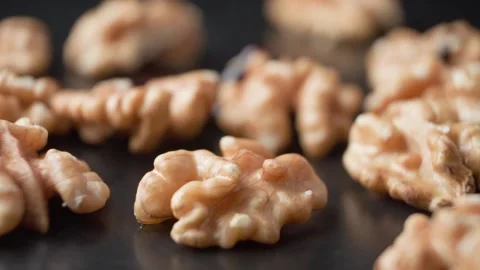Walnuts are drizzled with chocolate. Stock Footage 189322097