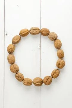 Walnuts arranged in a circle Stock Photos