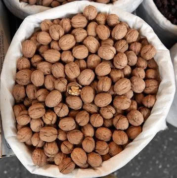 Walnuts background. Walnuts texture. Group walnuts background. Healthy organi Stock Photos