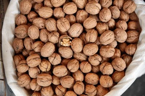 Walnuts background. Walnuts texture. Group walnuts background. Healthy organi Stock Photos