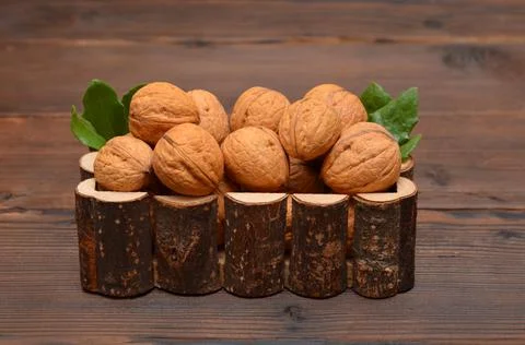 Walnuts in a basket close-up Stock Photos