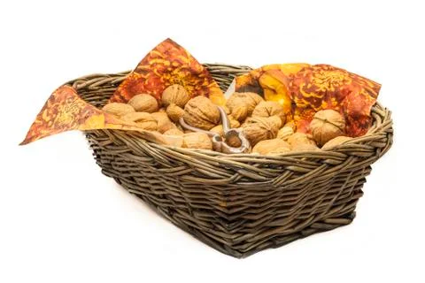 Walnuts in a basket isolated on white background Stock Photos
