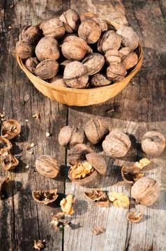 Walnuts in basket Stock Photos