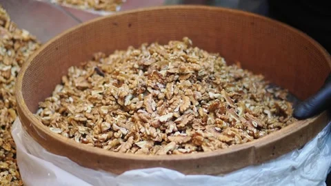 Walnuts being sorted in a local market in Istanbul Stock Footage 340863157
