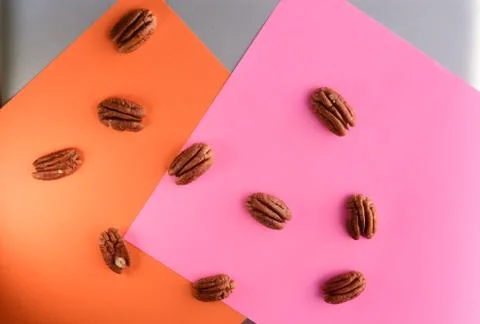 Walnuts on bright clorful background Stock Photos