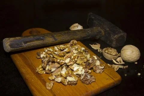 Walnuts Broken with an Old Hammer Stock Photos