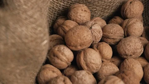 Walnuts in a canvas bag. Moving the focus Stock Footage 153765703