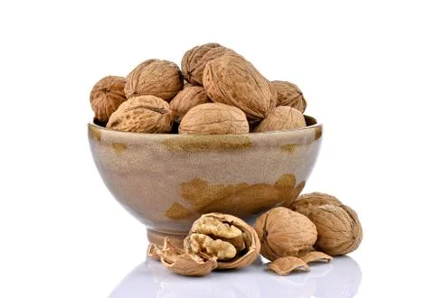 Walnuts in a ceramic bowl Stock Photos