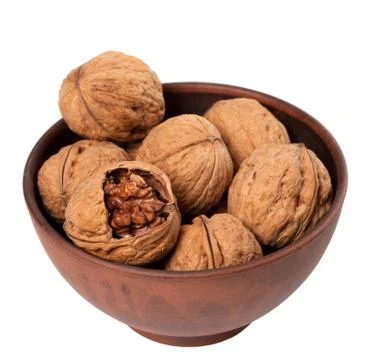 Walnuts in ceramic bowl Stock Photos