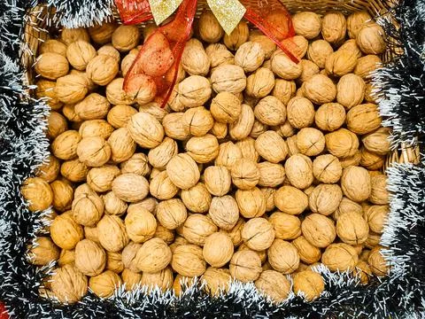 Walnuts in a Christmas basket Stock Photos