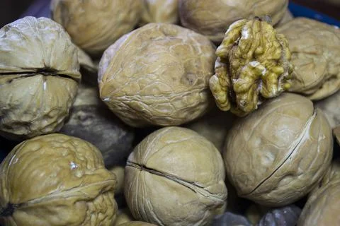 Walnuts close up, not peeled walnuts. Stock Photos