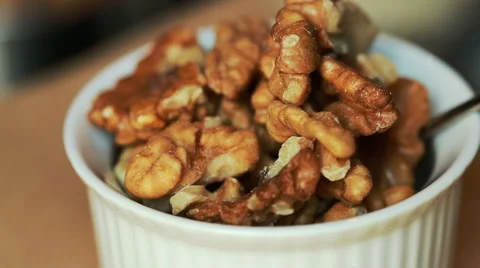Walnuts close up slowly rotate Stock Footage 64410096