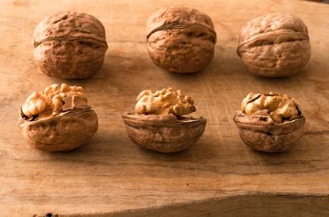 Walnuts on a cutting board Stock Photos