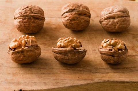 Walnuts on a cutting board Photos