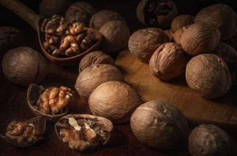 Walnuts on a dark background in a rustic style Stock-Fotos
