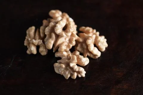 Walnuts on dark Stock Photos
