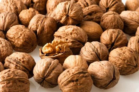 Walnuts in the foreground for diet Stock Photos
