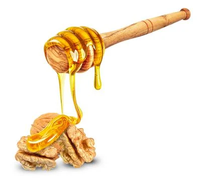 Walnuts with honey Stock Photos