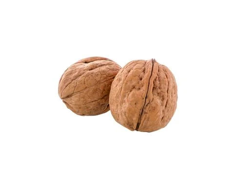 Walnuts isolated. Unpeeled walnuts with shell, close-up. Stock Photos