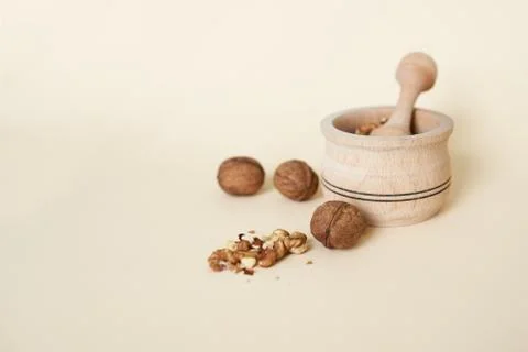 Walnuts kernels on the beige background Stock Photos
