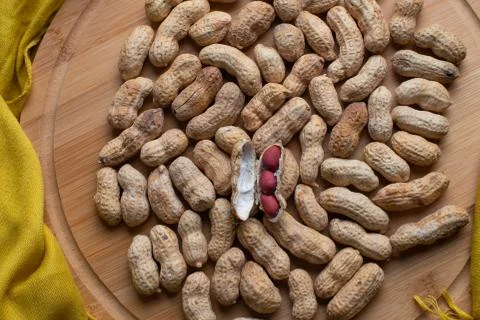 Walnuts kernels on dark desk with color background, Whole walnut in wood vint Stock Photos