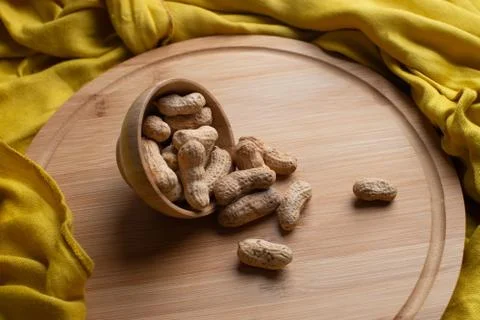 Walnuts kernels on dark desk with color background, Whole walnut in wood vint Stock Photos