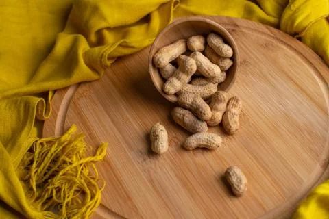 Walnuts kernels on dark desk with color background, Whole walnut in wood vint Stock Photos