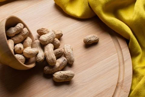 Walnuts kernels on dark desk with color background, Whole walnut in wood vint Stock Photos