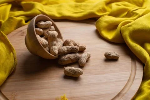 Walnuts kernels on dark desk with color background, Whole walnut in wood vint Stockfoto's