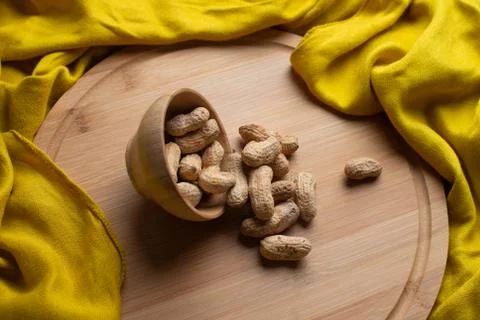 Walnuts kernels on dark desk with color background, Whole walnut in wood vint Stock Photos