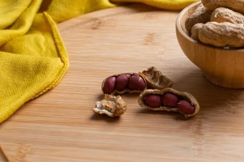 Walnuts kernels on dark desk with color background, Whole walnut in wood vint Stock Photos