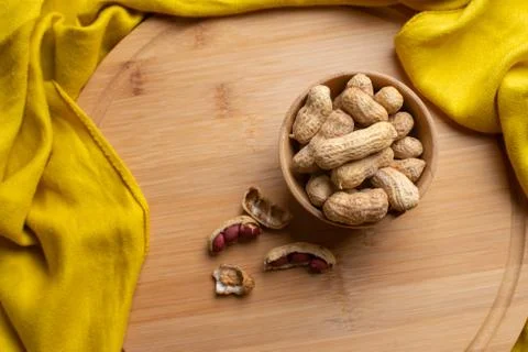Walnuts kernels on dark desk with color background, Whole walnut in wood vint Stock Photos