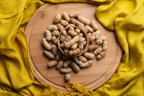 Walnuts kernels on dark desk with color background, Whole walnut in wood vint Stock Photos