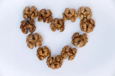 Walnuts kernels on white background. Stock Photos