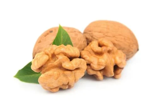 Walnuts with leafs Stock Photos