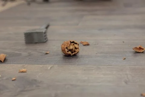 Walnuts with a nutcracker. Stock Photos