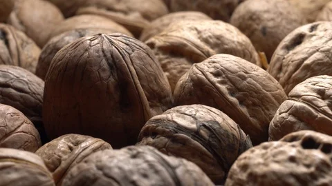 Walnuts in nutshell. Rotation. Closeup. Stock Footage 99370137