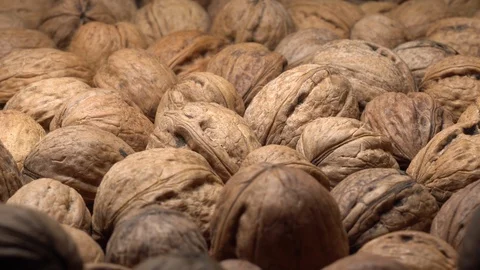 Walnuts in nutshell. Rotation. Closeup. Stock Footage 99370305