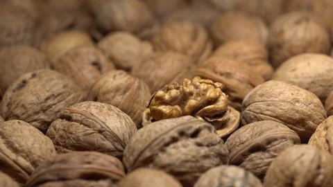 Walnuts in nutshell. Rotation. Closeup. Stock Footage 99371908