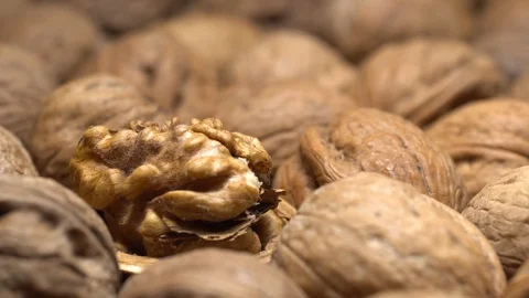 Walnuts in nutshell. Rotation. Closeup. Stock Footage 99372139