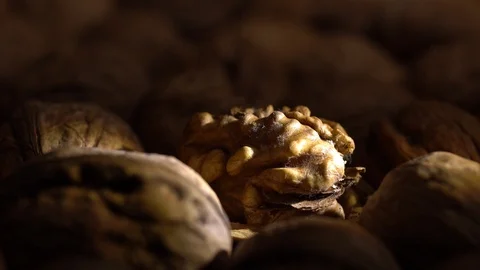 Walnuts in nutshell. Rotation. Closeup. Stock Footage 99372558