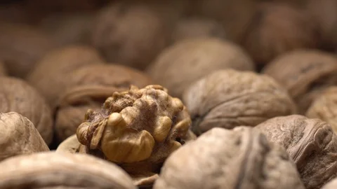 Walnuts in nutshell. Rotation. Closeup. Stock Footage 99372564
