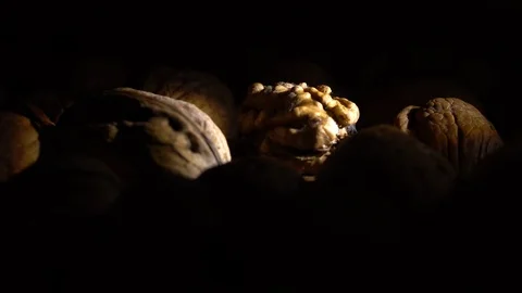 Walnuts in nutshell. Rotation. Closeup. Stock Footage 99372849