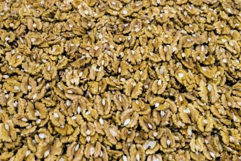 Walnuts. Peeled walnuts background texture. Organic nuts pattern. Design patt Stock Photos