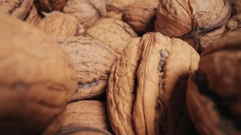 Walnuts in a pile macro probe lens camera motion Stock Footage