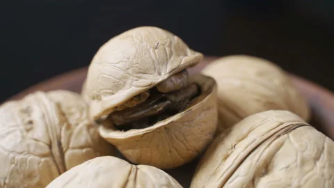 Walnuts rotation over white. Rotation shot. Stock Footage 99143676